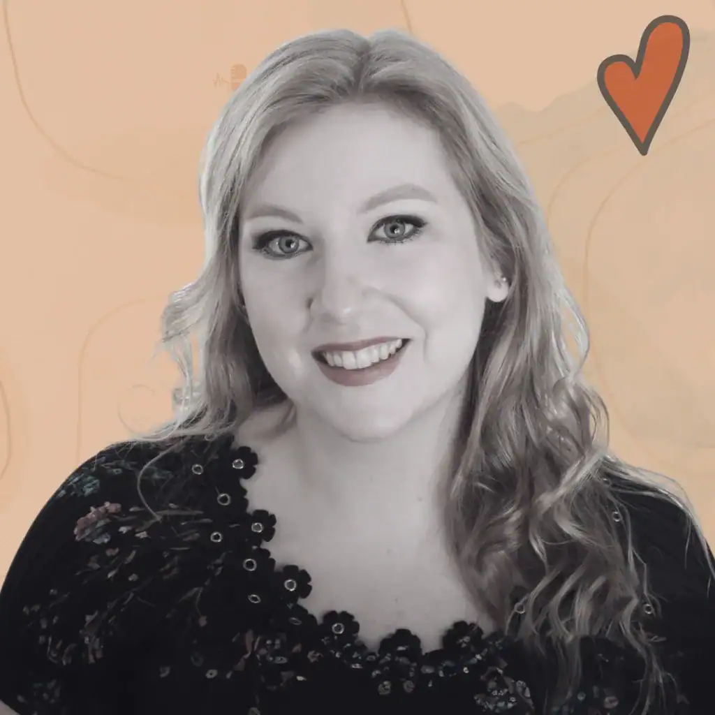 Woman smiling in black dress, representing birth support and empowerment.